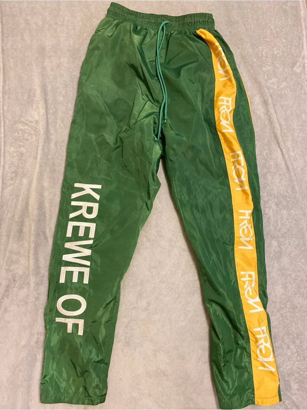 Green Joggers with Yellow Side Stripe and White Logo